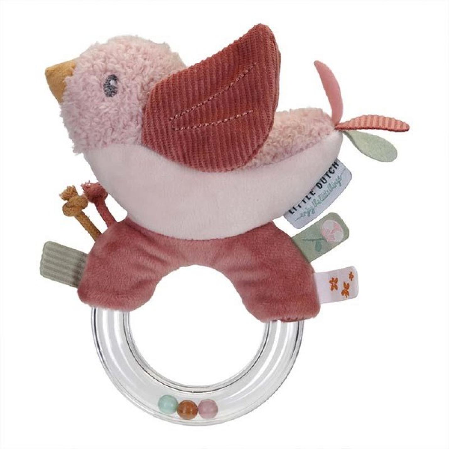 Ringrammelaar vogel met plastic ring met 3 kralen erin en een roze vogel met oranje zit aan de ring