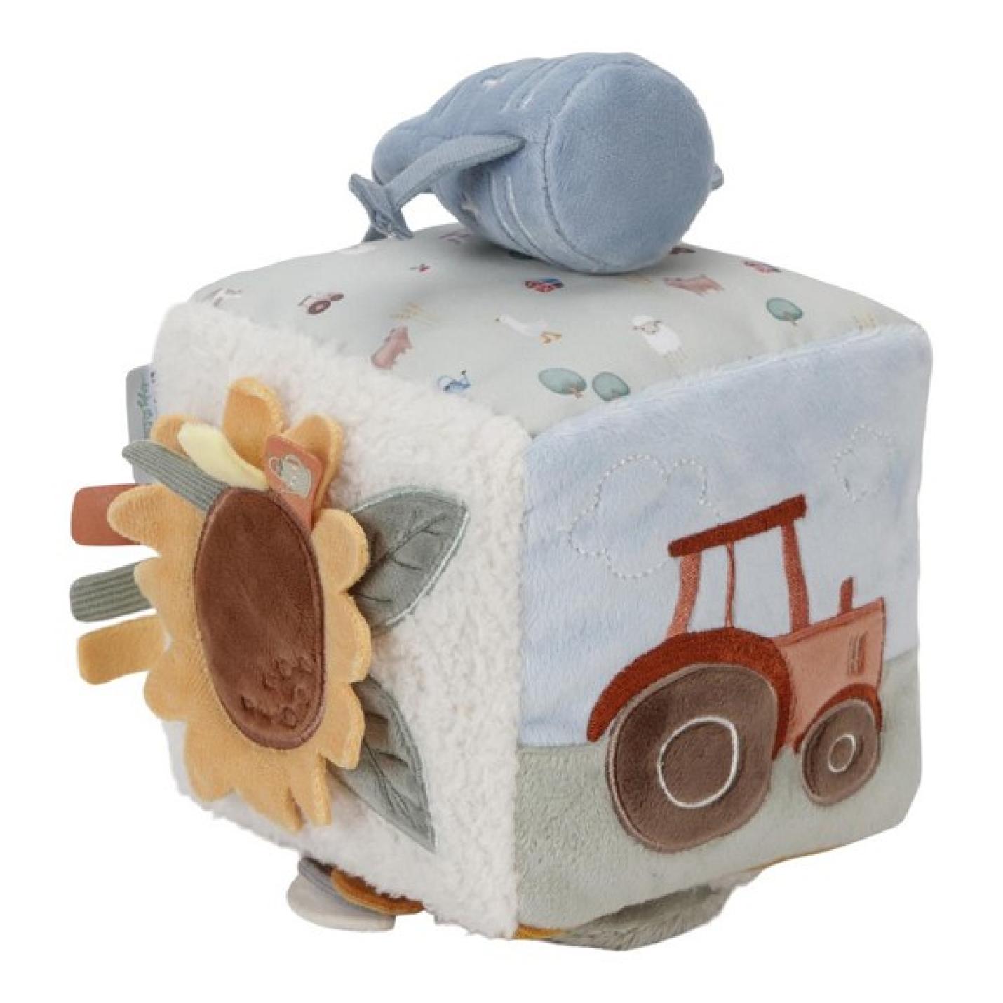Activiteitenkubus Little Farm is een stoffen grijze kubus met tractor, zonnebloem, kip, schaap, gieter
