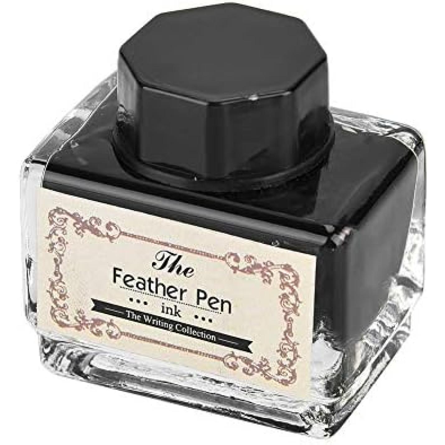 Een glazen inktpot met een zwarte dop gelabeld "Schrijven met veer... de schrijfcollectie.