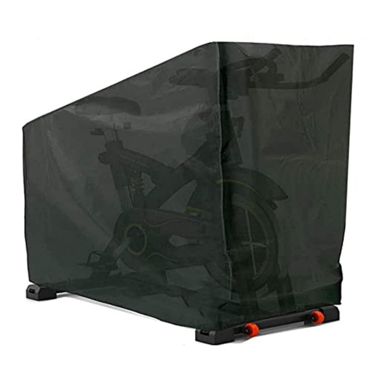 Een hometrainer bedekt met een doorschijnende zwarte Hometrainer ondersteunende fietsen, tuinmeubelen betaalbare, rechtopstaande indoor-fietsen, stofdicht/waterdicht, zonwerend, roterende schoffels, geplaatst tegen een effen achtergrond.