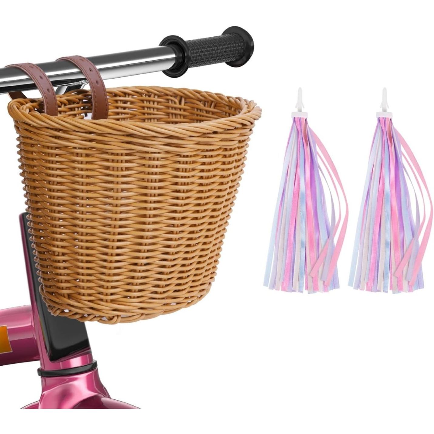 Kinderfietsmand: de perfecte manier om te laten genieten van de fiets, bevestigd aan een scooterstuur naast hangende kleurrijke lintstreamers.