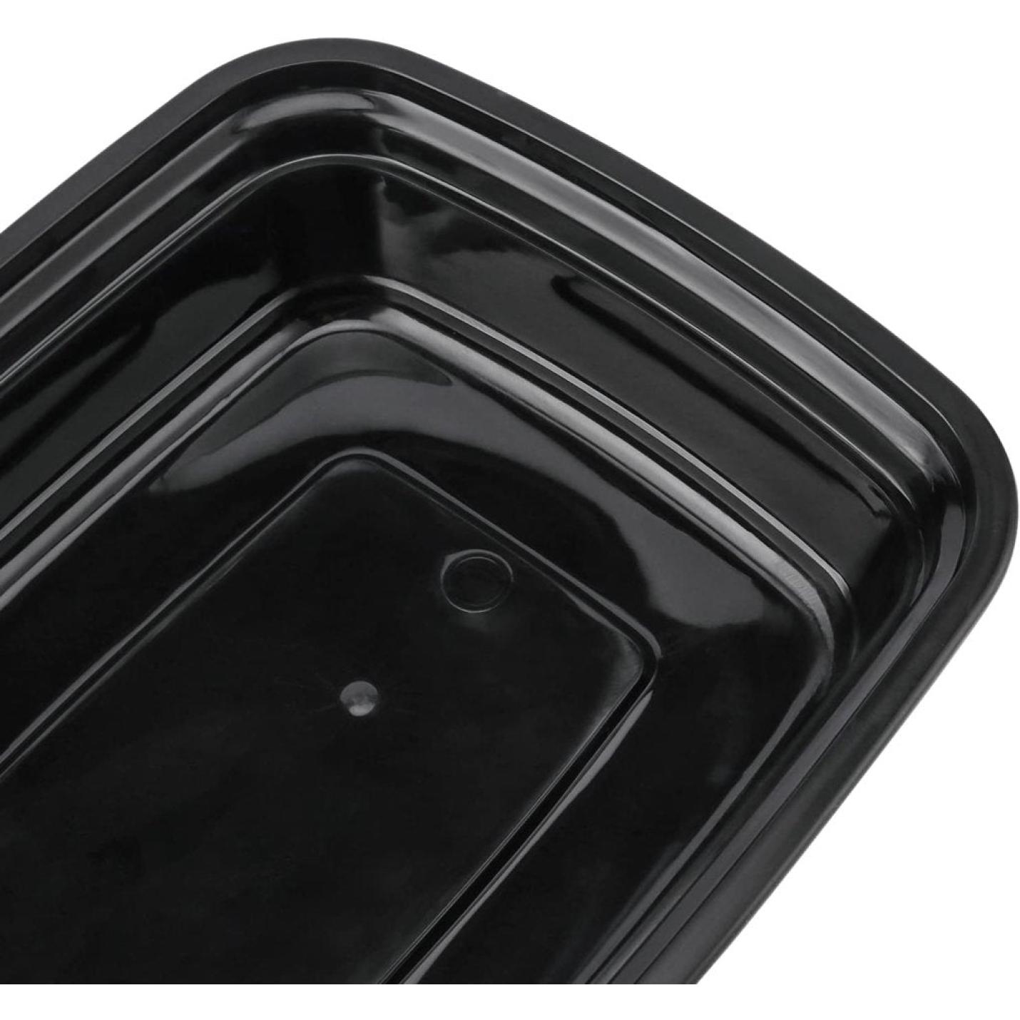 De 🍱 Maaltijdvoorbereiding eenvoudiger dan ooit – Herbruikbare meal prep bakjes! zijn zwarte rechthoekige plastic bakjes met een glanzende afwerking, met opstaande randen en een kleine ronde inkeping bij een hoek, ideaal voor meal prep.