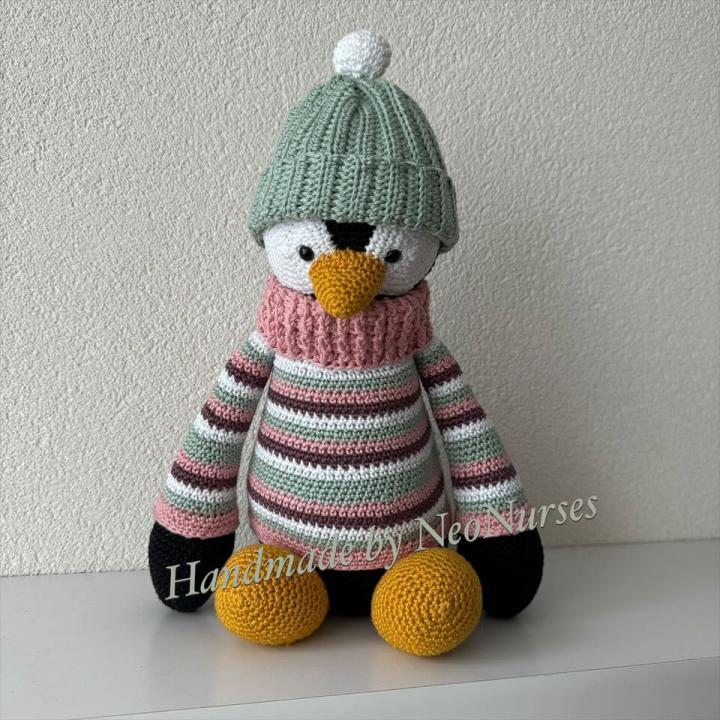 Pinquïn Pip met muts groen